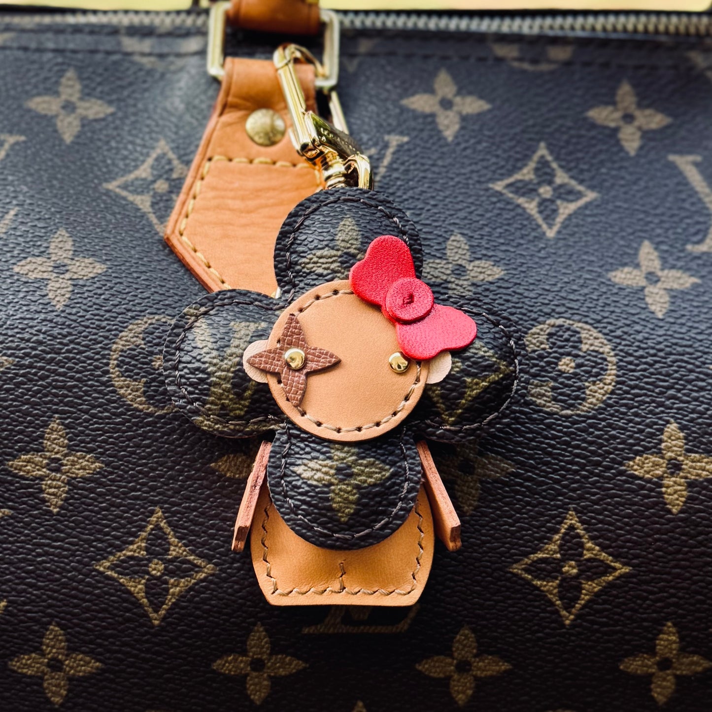 Vivi Bag Charm In Monogram With Bright Red Bow