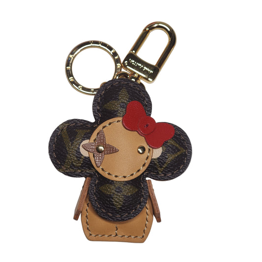 Vivi Bag Charm In Monogram With Bright Red Bow