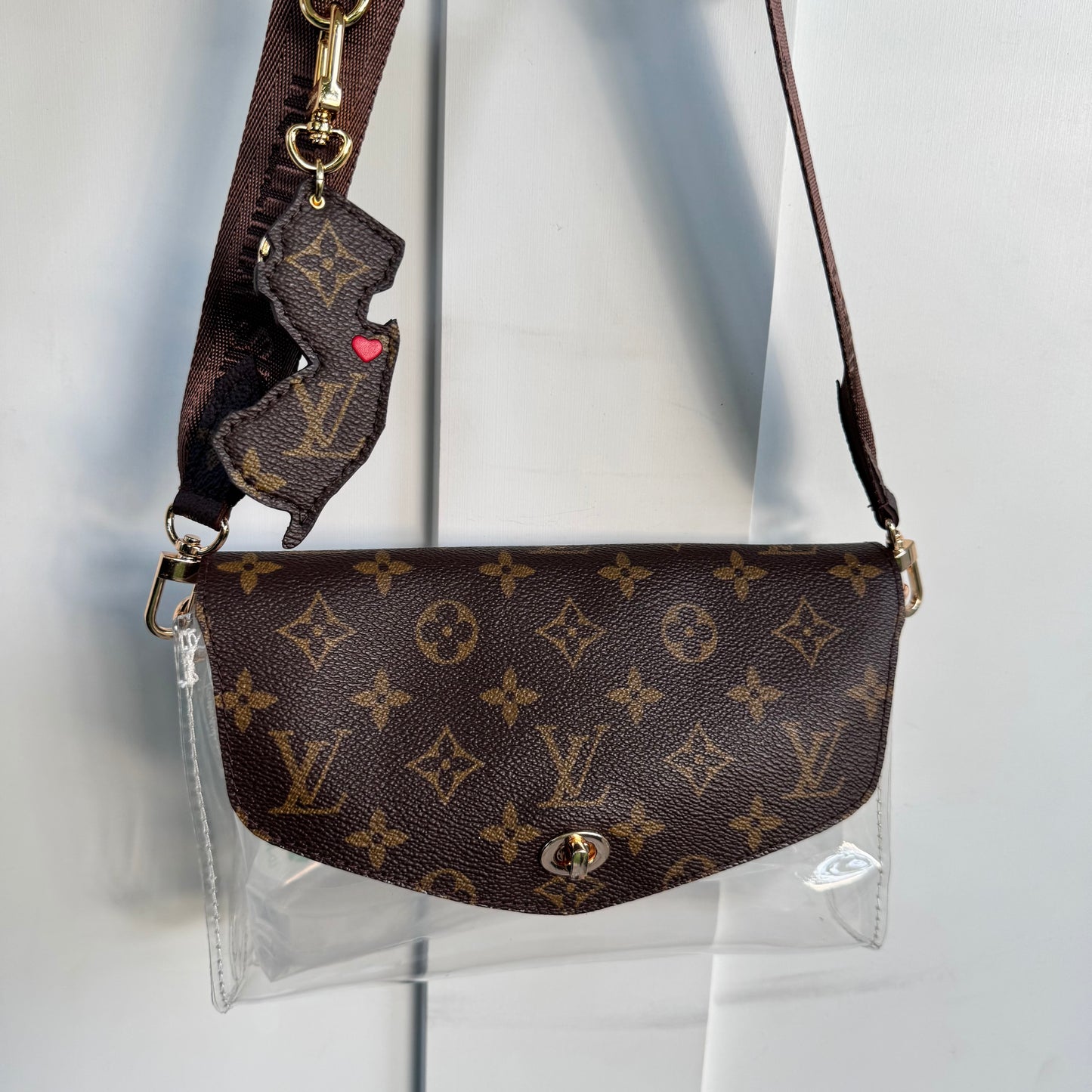 Miss Popularity Mono Clear Lulu Stadium Crossbody Bag With Turnlock & Brown Strap