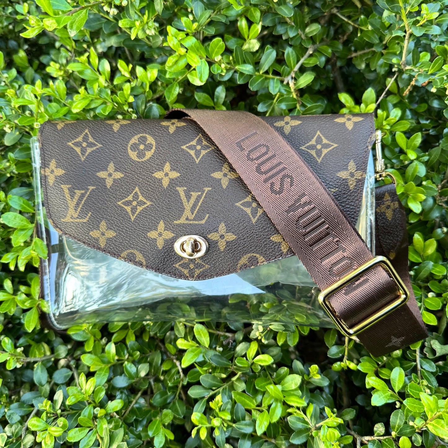 Miss Popularity Mono Clear Lulu Stadium Crossbody Bag With Turnlock & Brown Strap