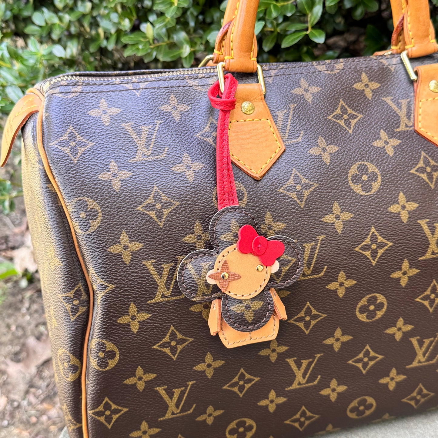 Vivi Bag Charm In Monogram With Bright Red Bow